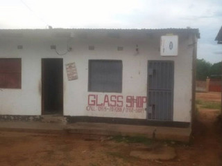 Open Area Shop with Wooden Shelves in Highlands Market